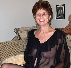 hot low-spirited brunette granny stripping