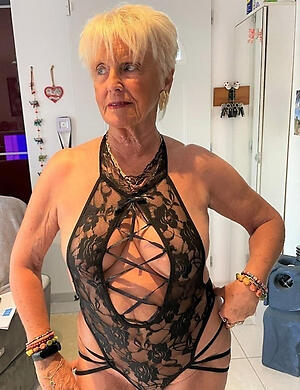amazing granny in underclothes poses scant