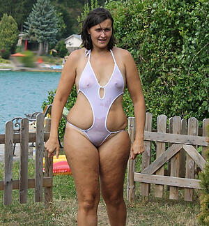 glum granny adjacent to bikini poses adjacent to tyro pics