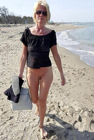 pic not far from older woman on beach