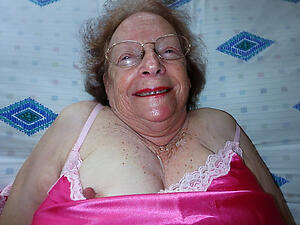photoshooting adjacent to undress age-old granny in glasses